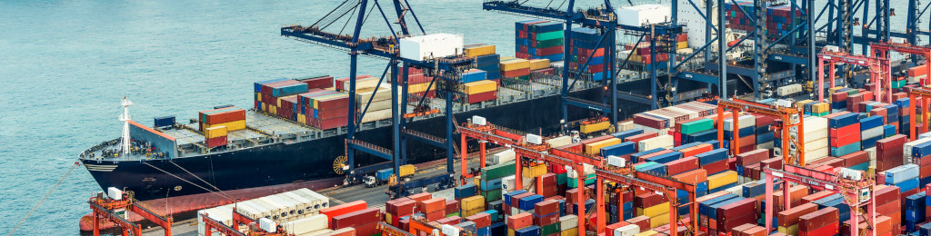Shipping containers stacked at a port terminal
