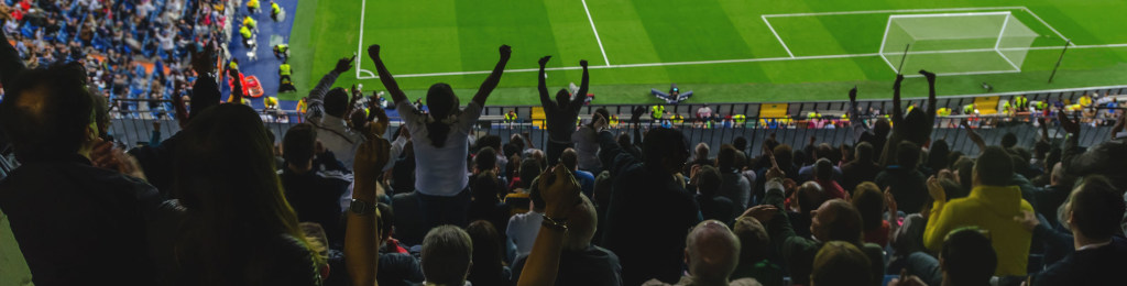 A crowd at a football stadium